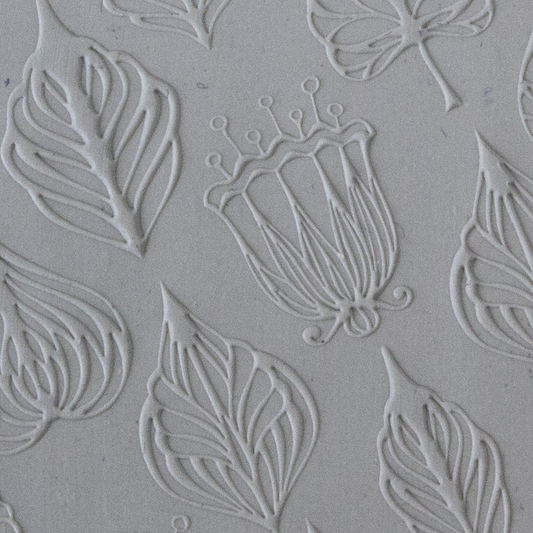 Texture Tile - Flower Shower Embossed sample rolled into clay