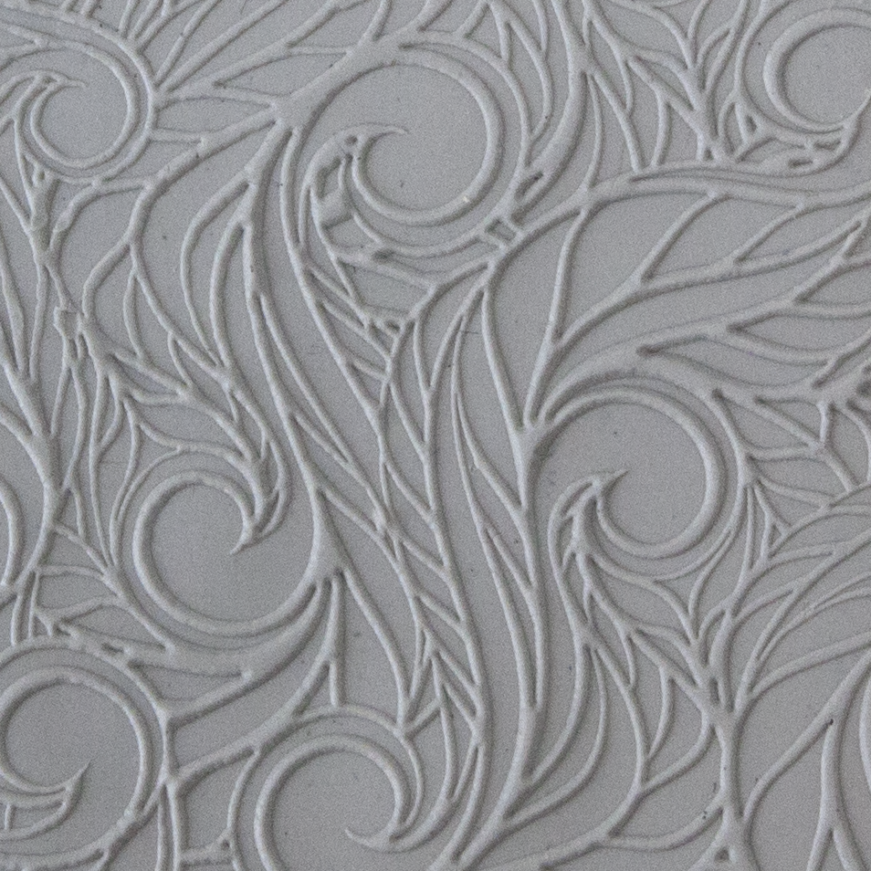 Texture Tile - Feather Flurry Embossed sample rolled into clay