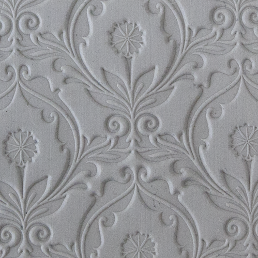 Texture Tile - Dandelion sample rolled into clay