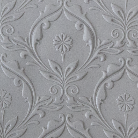 Texture Tile - Dandelion Embossed sample rolled into clay