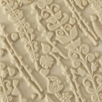 Texture Tile - Spring Love. Beige Texture Tiles are flexible, washable and can be used with any soft clay. Spritz with CoolSlip or dust on Dry Powder Release for stick-free impressions when using metal clay and polymer clay.