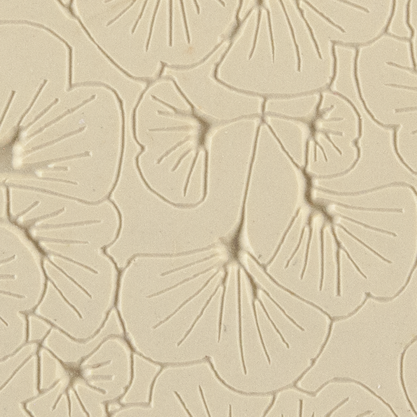 Texture Tile - Gingko Leaves Embossed. Beige Texture Tiles are flexible, washable and can be used with any soft clay. Spritz with CoolSlip or dust on Dry Powder Release for stick-free impressions when using metal clay and polymer clay.