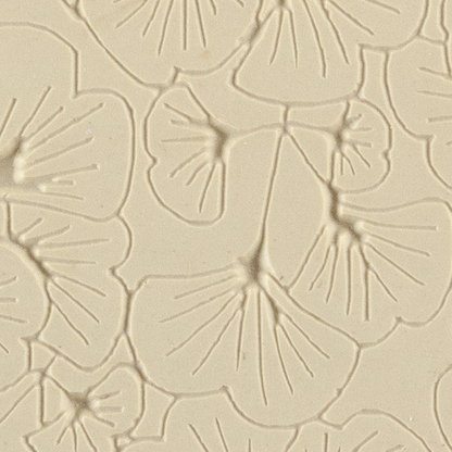 Texture Tile - Gingko Leaves Embossed. Beige Texture Tiles are flexible, washable and can be used with any soft clay. Spritz with CoolSlip or dust on Dry Powder Release for stick-free impressions when using metal clay and polymer clay.