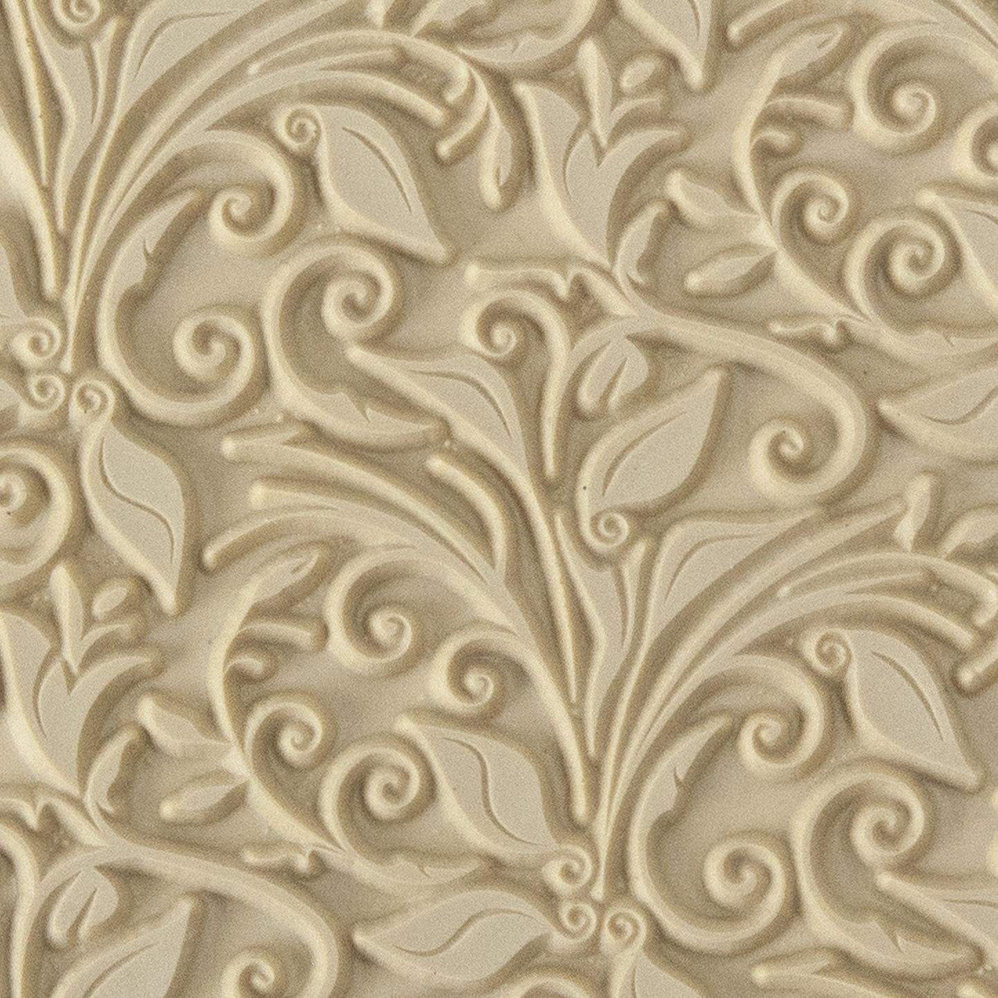 Texture Tile - Leaves & Tendrils. Beige Texture Tiles are flexible, washable and can be used with any soft clay. Spritz with CoolSlip or dust on Dry Powder Release for stick-free impressions when using metal clay and polymer clay.