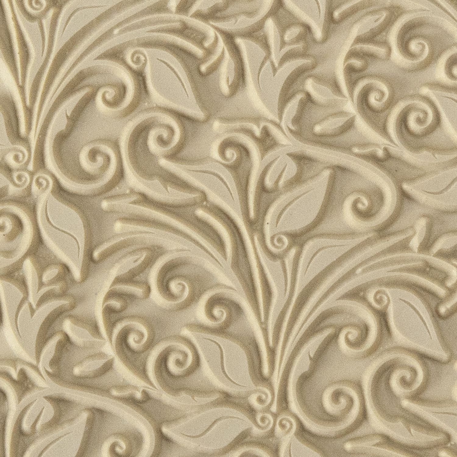 Texture Tile - Leaves & Tendrils. Beige Texture Tiles are flexible, washable and can be used with any soft clay. Spritz with CoolSlip or dust on Dry Powder Release for stick-free impressions when using metal clay and polymer clay.