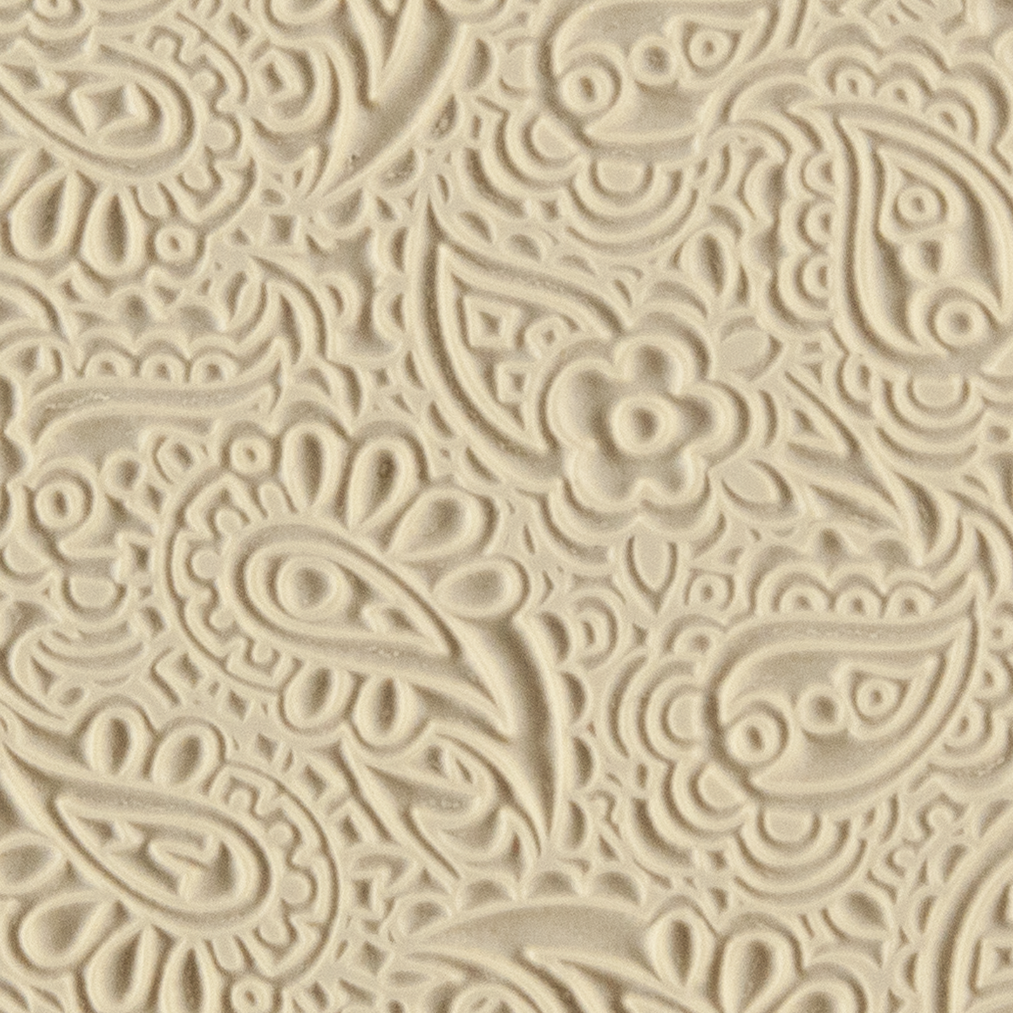 Texture Tile - Paisley. Beige Texture Tiles are flexible, washable and can be used with any soft clay. Spritz with CoolSlip or dust on Dry Powder Release for stick-free impressions when using metal clay and polymer clay.