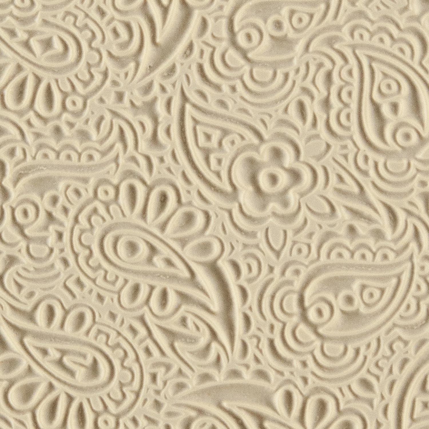 Texture Tile - Paisley. Beige Texture Tiles are flexible, washable and can be used with any soft clay. Spritz with CoolSlip or dust on Dry Powder Release for stick-free impressions when using metal clay and polymer clay.