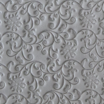 Texture Tile - Floral Curls sample rolled into clay