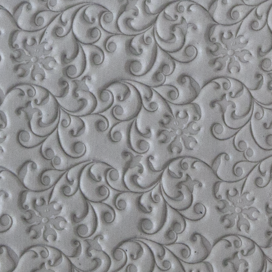 Texture Tile - Floral Curls sample rolled into clay