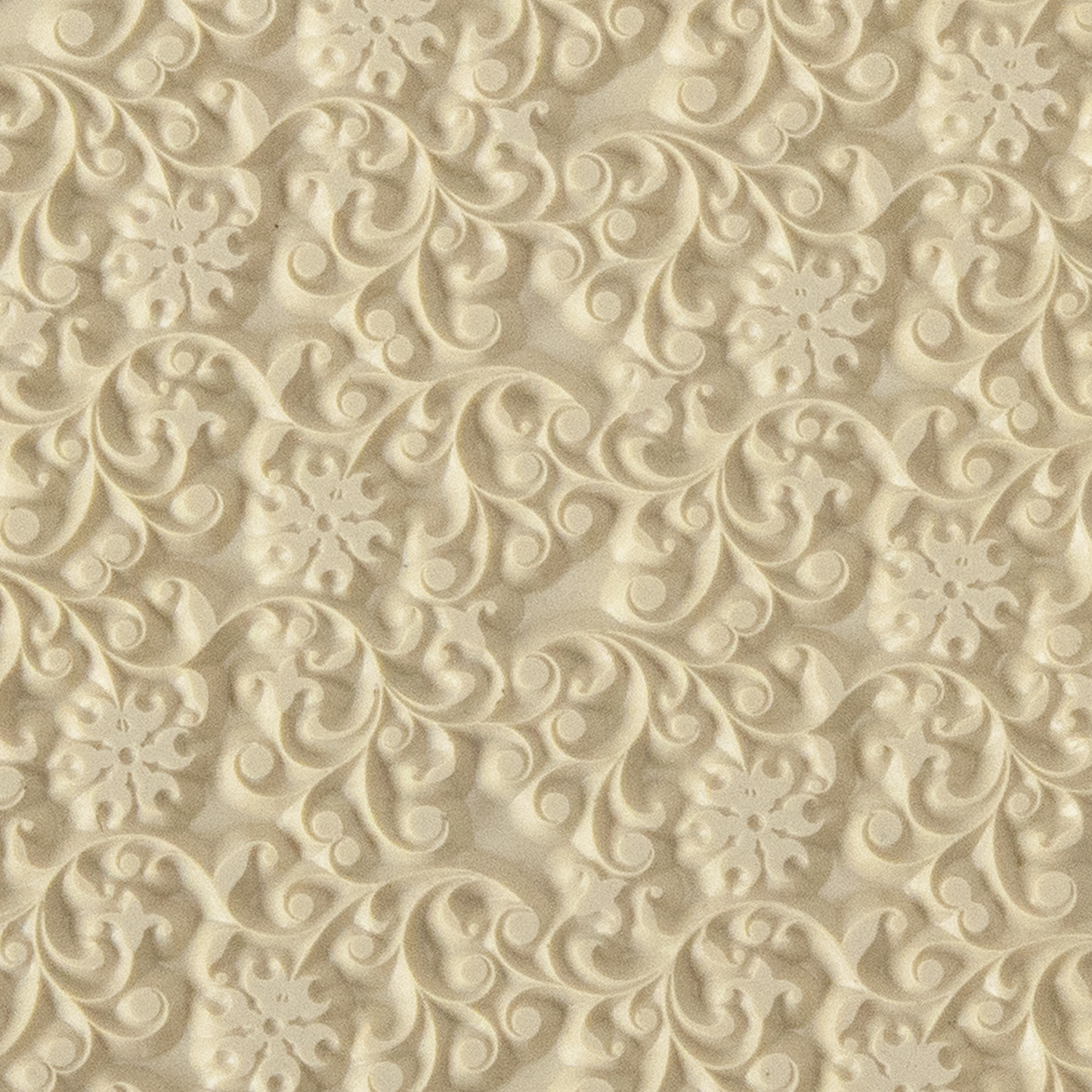 Texture Tile - Floral Curls. Beige Texture Tiles are flexible, washable and can be used with any soft clay. Spritz with CoolSlip or dust on Dry Powder Release for stick-free impressions when using metal clay and polymer clay.
