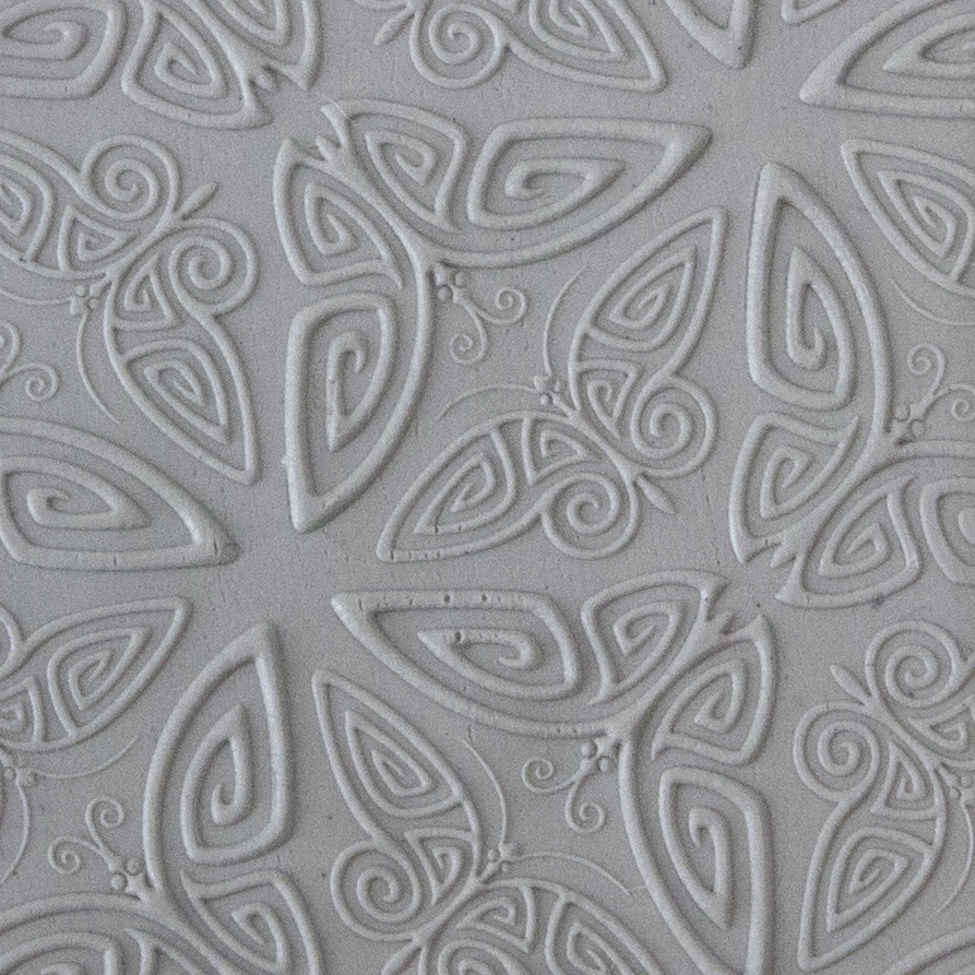 Texture Tile - Butterfly Bash Embossed sample rolled into clay