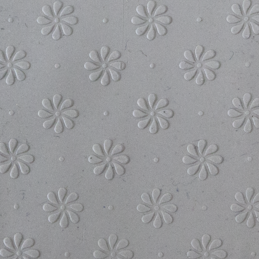Texture Tile - Field of Daisies Embossed sample rolled into clay