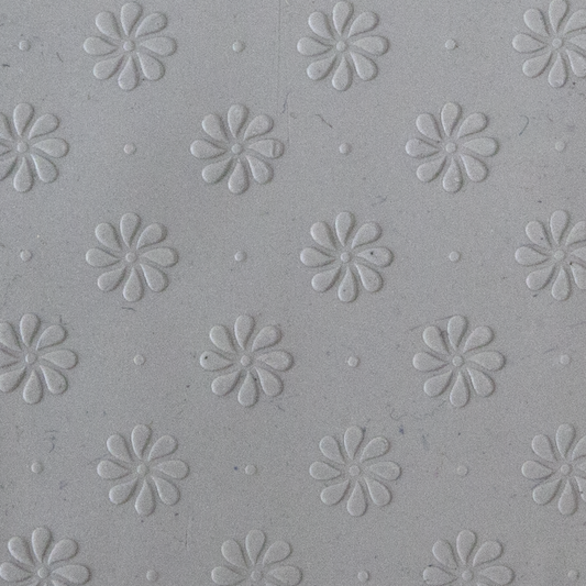 Texture Tile - Field of Daisies Embossed sample rolled into clay