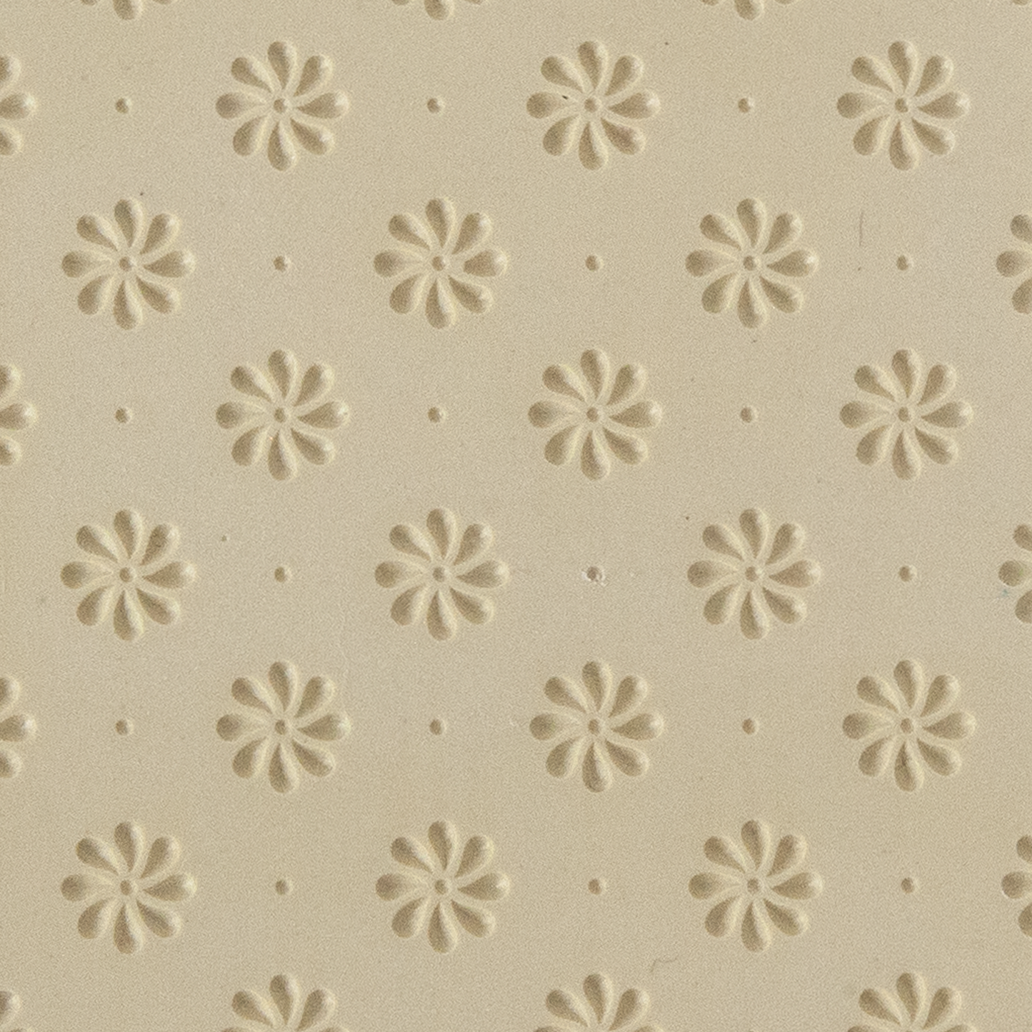 Texture Tile - Field of Daisies Embossed. Beige Texture Tiles are flexible, washable and can be used with any soft clay. Spritz with CoolSlip or dust on Dry Powder Release for stick-free impressions when using metal clay and polymer clay.