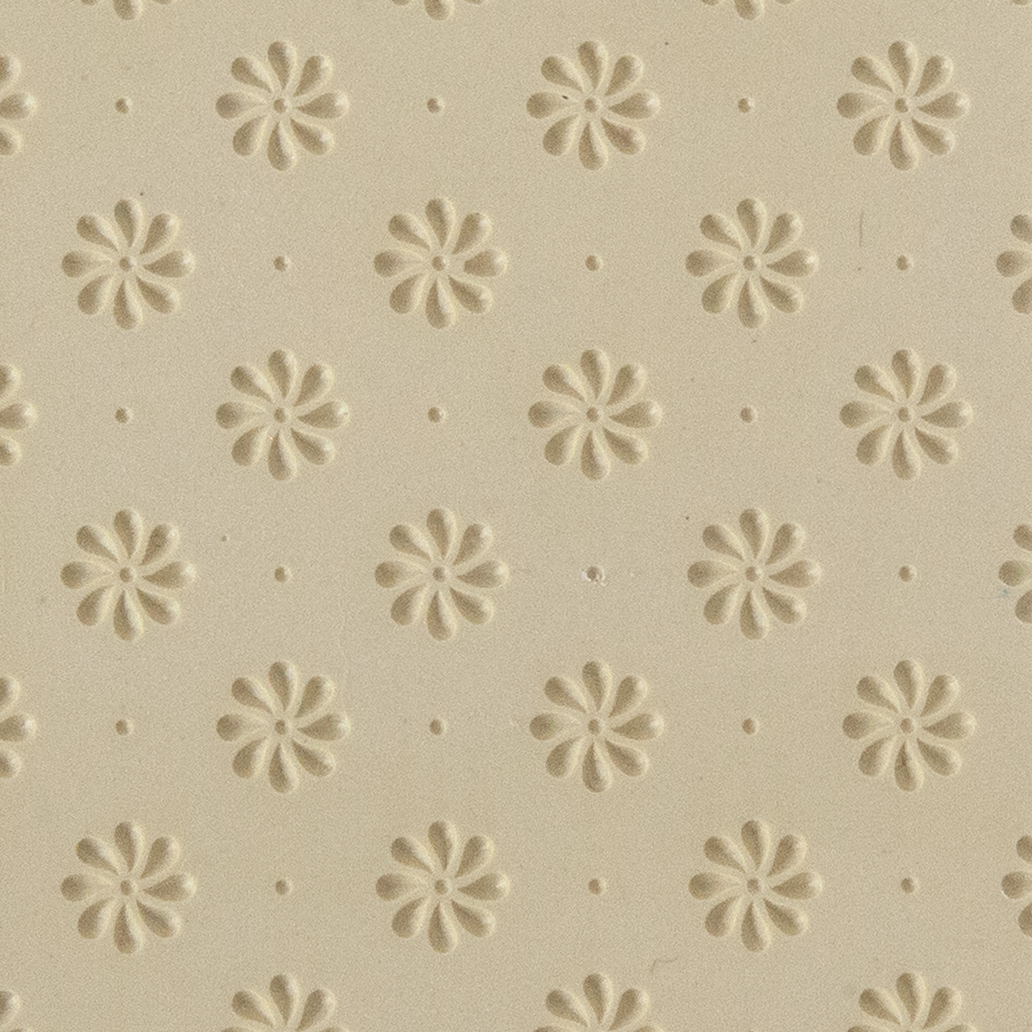 Texture Tile - Field of Daisies Embossed. Beige Texture Tiles are flexible, washable and can be used with any soft clay. Spritz with CoolSlip or dust on Dry Powder Release for stick-free impressions when using metal clay and polymer clay.