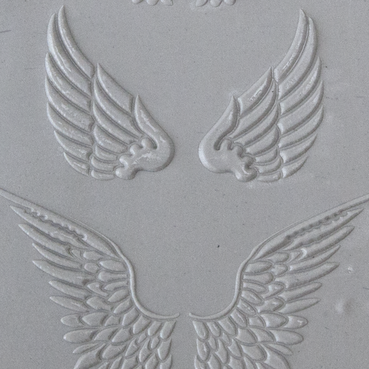 Texture Tile - Angel Wings Embossed sample rolled into clay