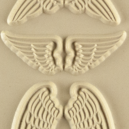 Texture Tile - Natural Wings. Beige Texture Tiles are flexible, washable and can be used with any soft clay. Spritz with CoolSlip or dust on Dry Powder Release for stick-free impressions when using metal clay and polymer clay.