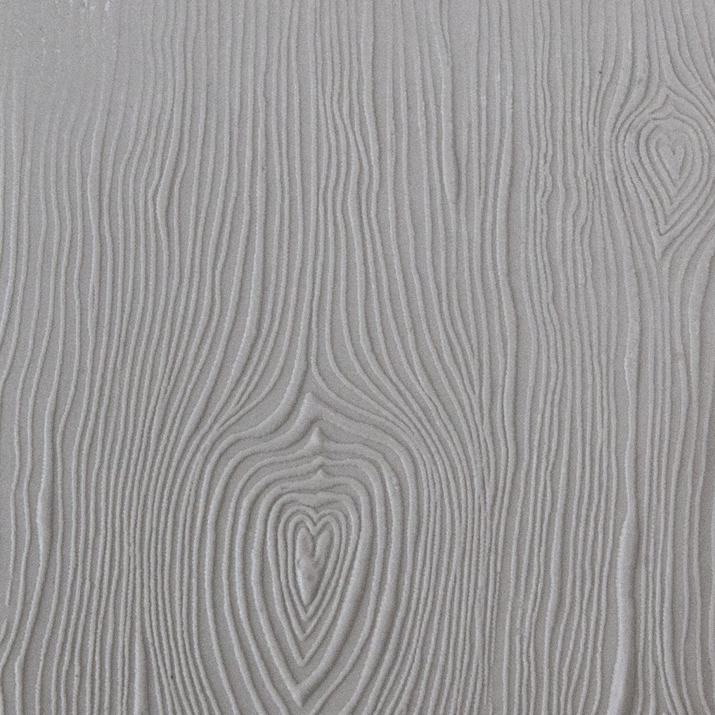 Texture Tile - Wood Grain Love sample rolled into clay
