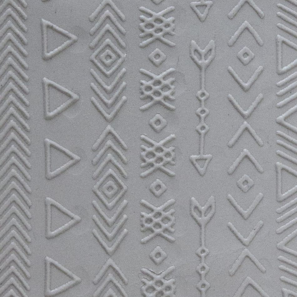 Texture Tile - Tribal Borders Fineline sample rolled into clay