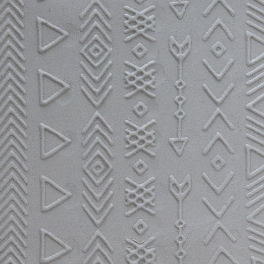 Texture Tile - Tribal Borders Fineline sample rolled into clay