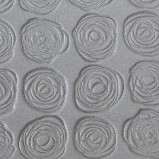 Texture Tile - Tissue Flowers sample rolled into clay