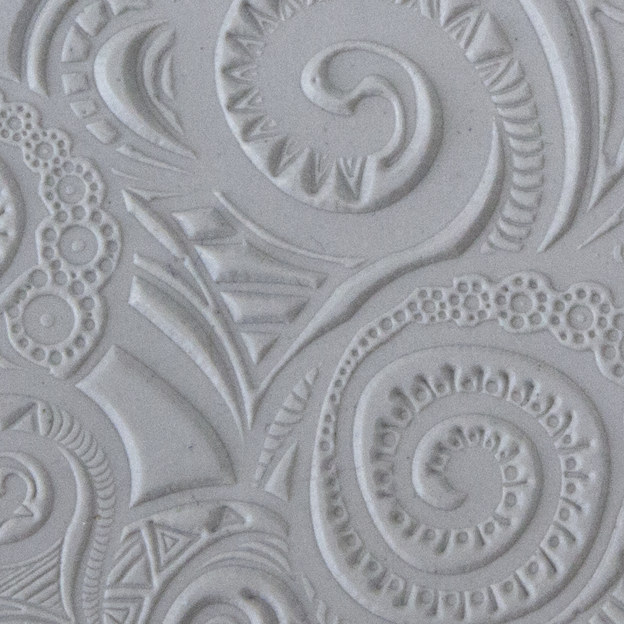 Texture Tile - Swirly Hearts sample rolled into clay