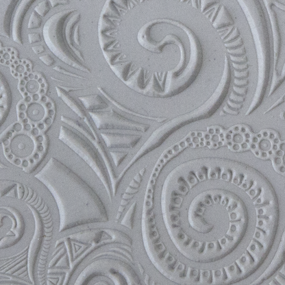 Texture Tile - Swirly Hearts sample rolled into clay