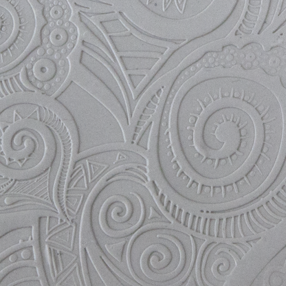 Texture Tile - Swirly Hearts Embossed sample rolled into clay