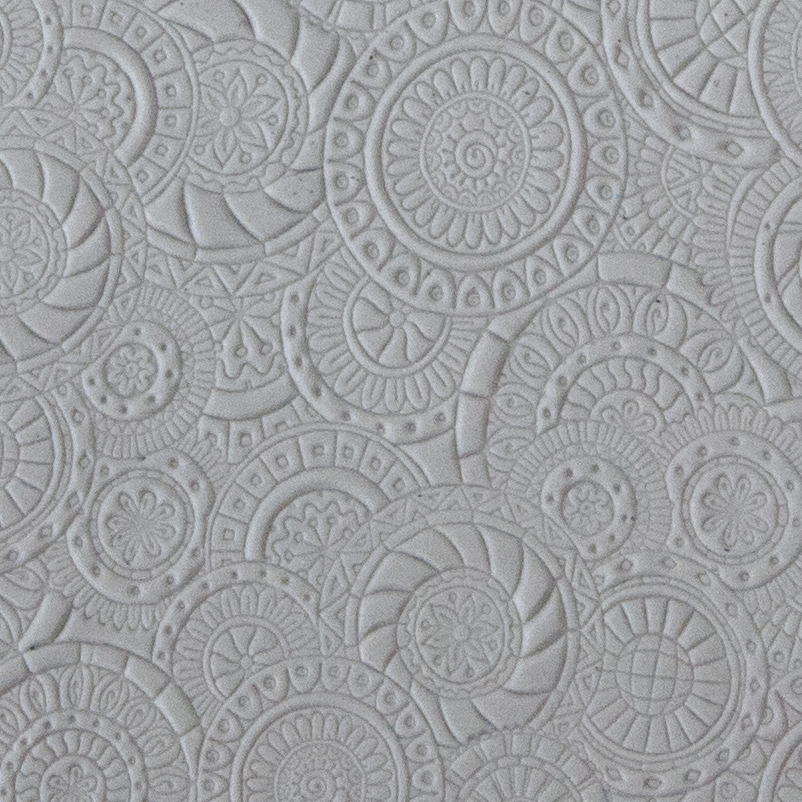 Texture Tile - Kaleidoscope Overload sample rolled into clay