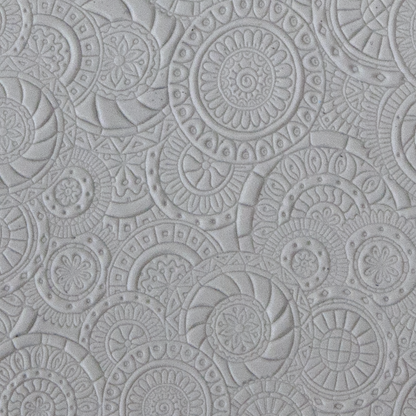 Texture Tile - Kaleidoscope Overload sample rolled into clay