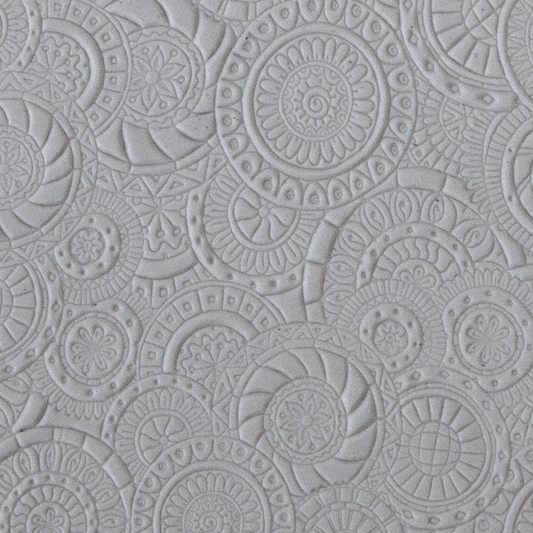 Texture Tile - Kaleidoscope Overload sample rolled into clay