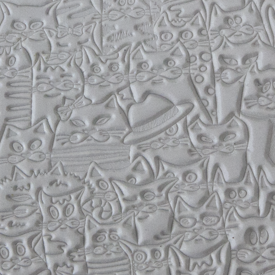 Texture Tile - Feline Friends sample rolled into clay