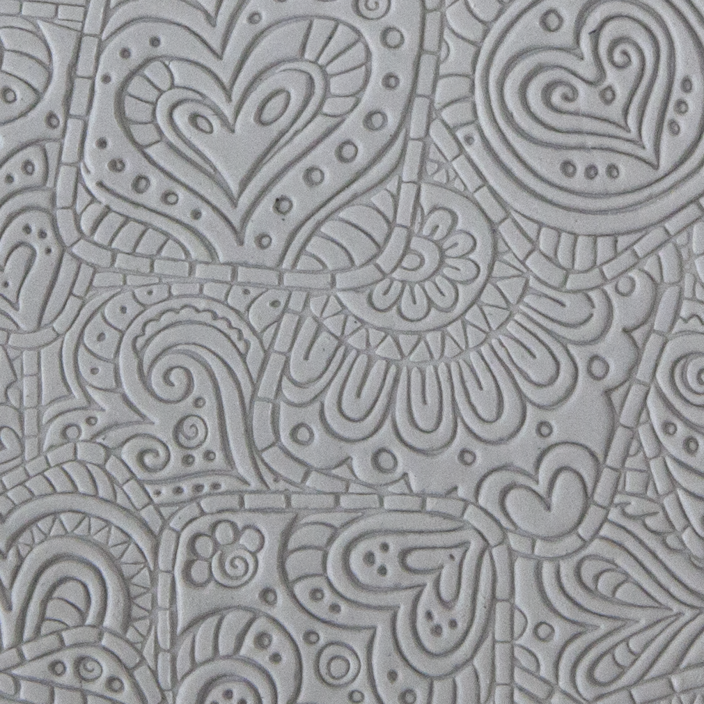 Texture Tile - Doodling Hearts sample rolled into clay