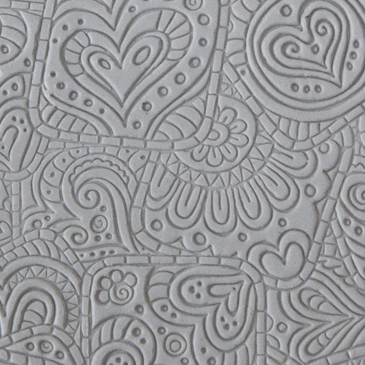 Texture Tile - Doodling Hearts sample rolled into clay