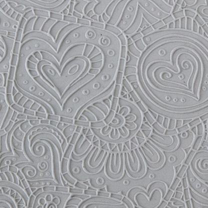 Texture Tile - Doodling Hearts Fineline sample rolled into clay