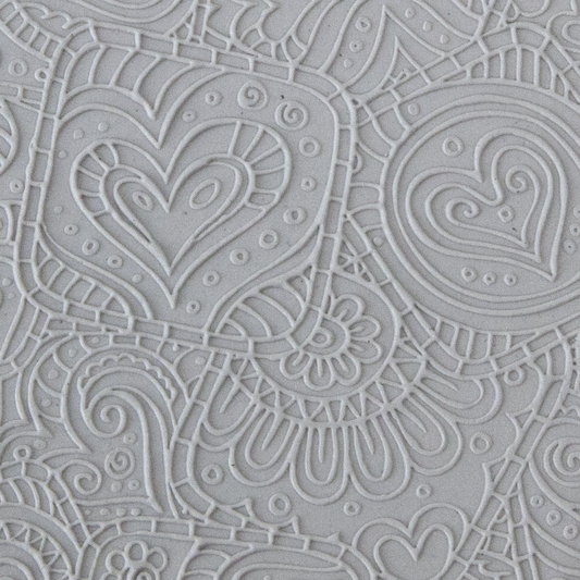 Texture Tile - Doodling Hearts Fineline sample rolled into clay