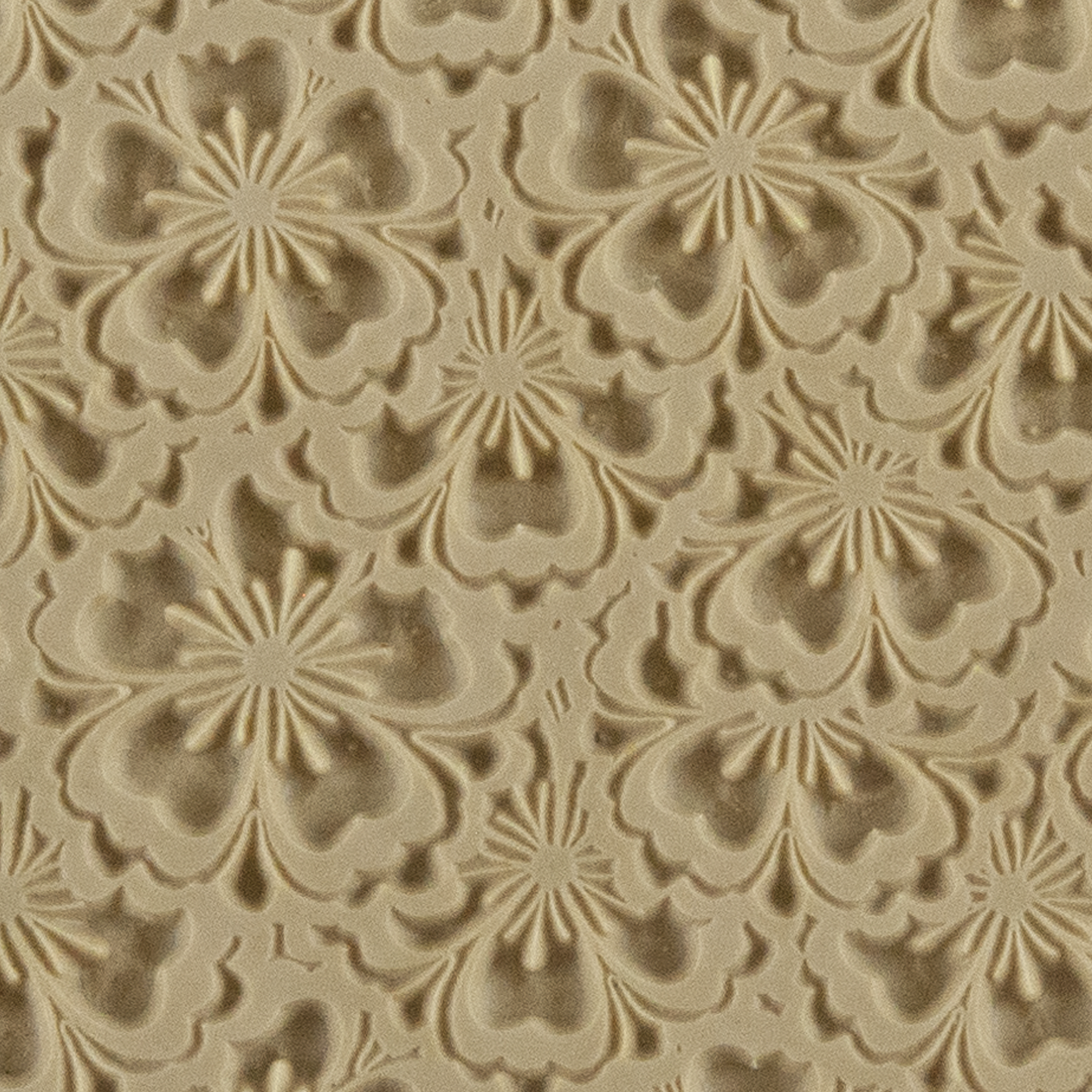 Texture Tile - Flowering Fields. Beige Texture Tiles are flexible, washable and can be used with any soft clay. Spritz with CoolSlip or dust on Dry Powder Release for stick-free impressions when using metal clay and polymer clay.