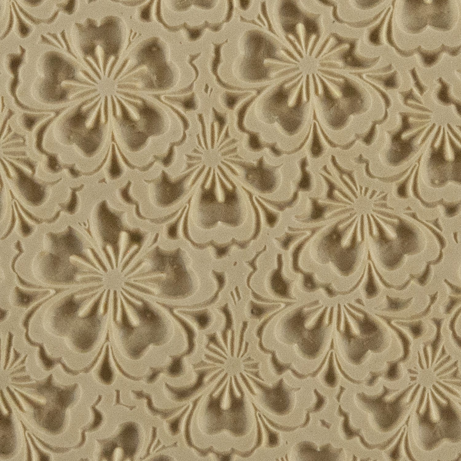 Texture Tile - Flowering Fields. Beige Texture Tiles are flexible, washable and can be used with any soft clay. Spritz with CoolSlip or dust on Dry Powder Release for stick-free impressions when using metal clay and polymer clay.