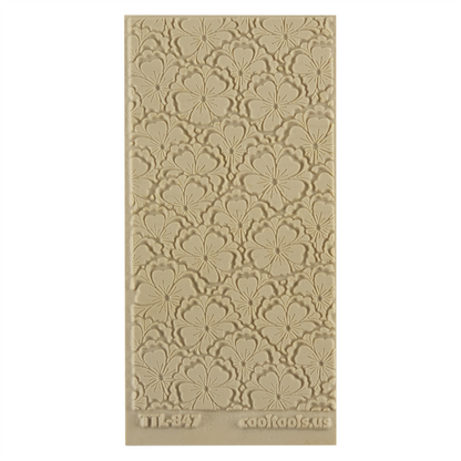 Texture Tile - Flowering Fields Embossed. Beige Texture Tiles are flexible, washable and can be used with any soft clay. Spritz with CoolSlip or dust on Dry Powder Release for stick-free impressions when using metal clay and polymer clay.
