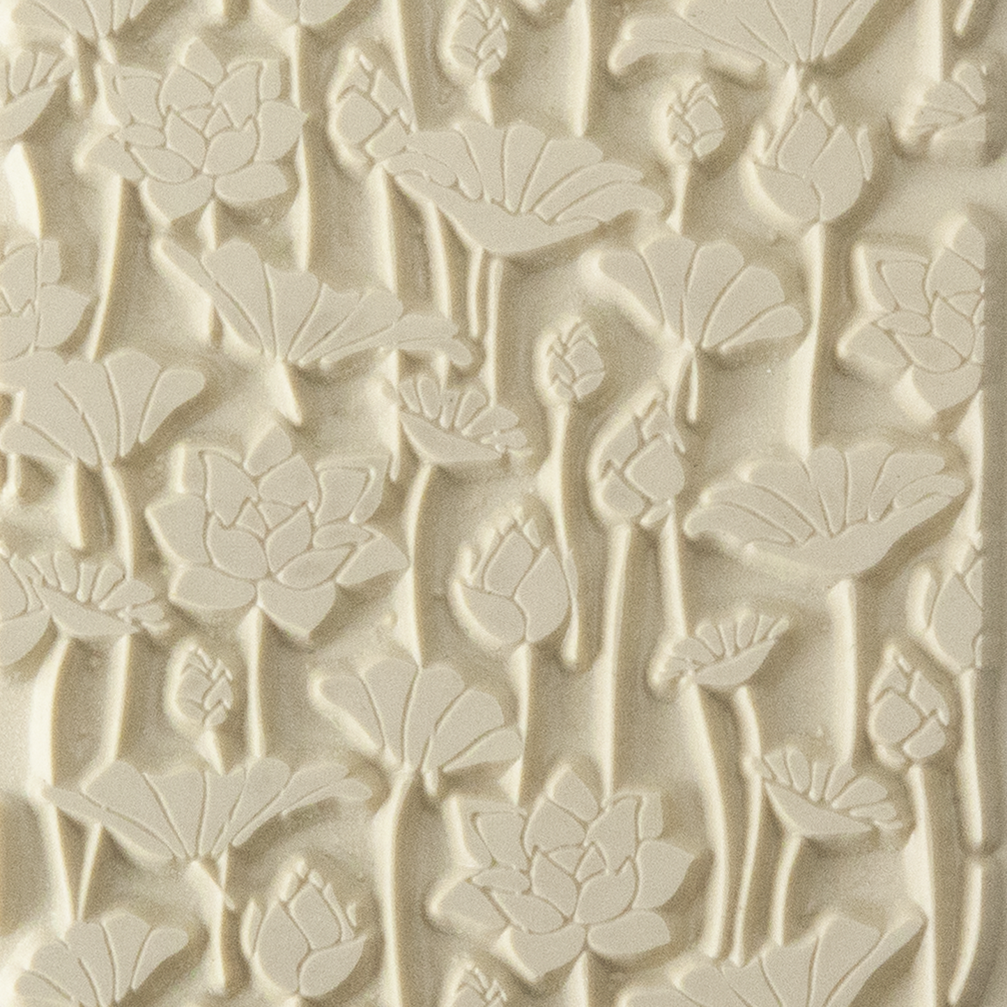 Texture Tile - Flowing Flowers. Beige Texture Tiles are flexible, washable and can be used with any soft clay. Spritz with CoolSlip or dust on Dry Powder Release for stick-free impressions when using metal clay and polymer clay.
