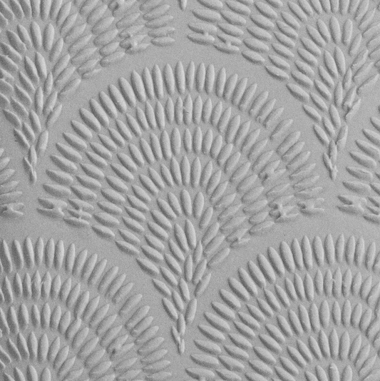 Texture Tile - Abstract Sunrise Embossed sample rolled into clay