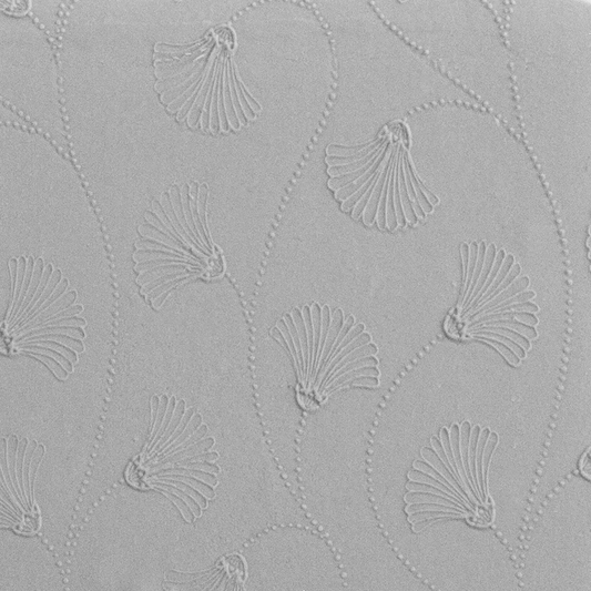 Texture Tile - Dotted Vines Embossed sample rolled into clay