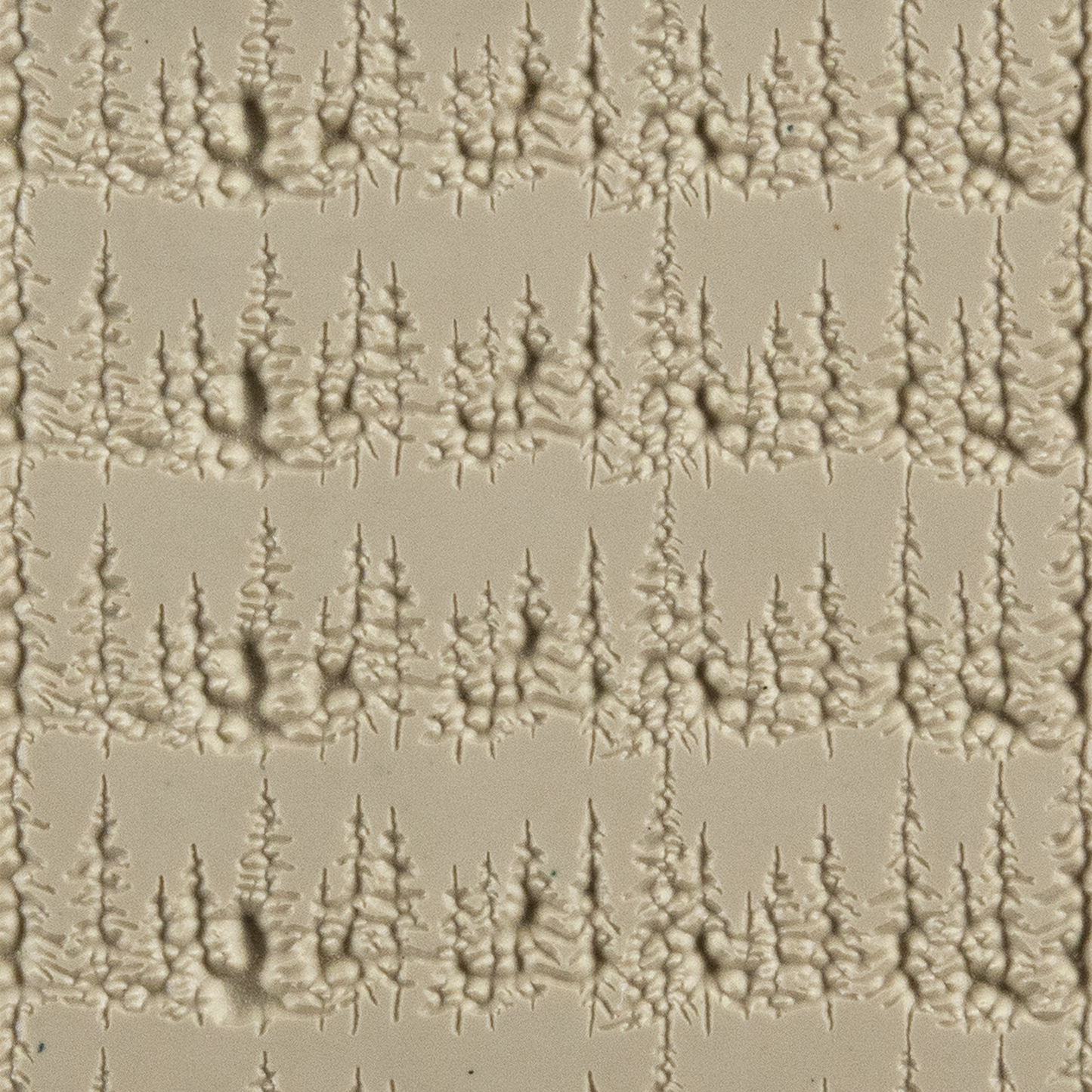 Texture Tile - Wisconsin Pines Embossed. Beige Texture Tiles are flexible, washable and can be used with any soft clay. Spritz with CoolSlip or dust on Dry Powder Release for stick-free impressions when using metal clay and polymer clay.