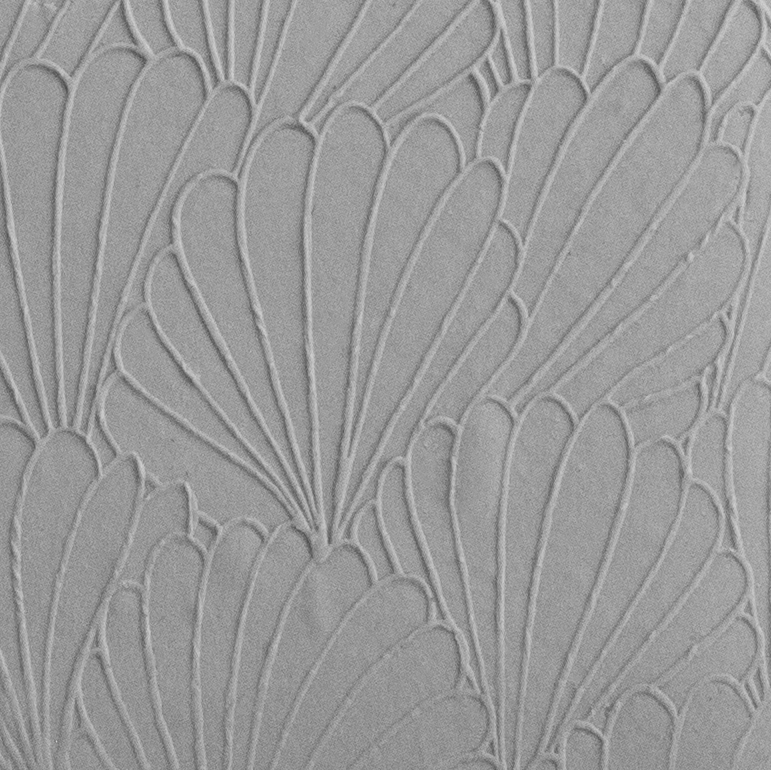 Texture Tile - In the Current Embossed sample rolled into clay