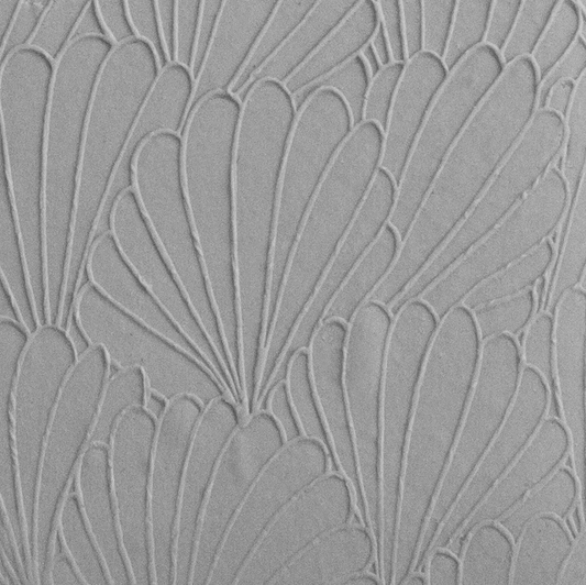 Texture Tile - In the Current Embossed sample rolled into clay