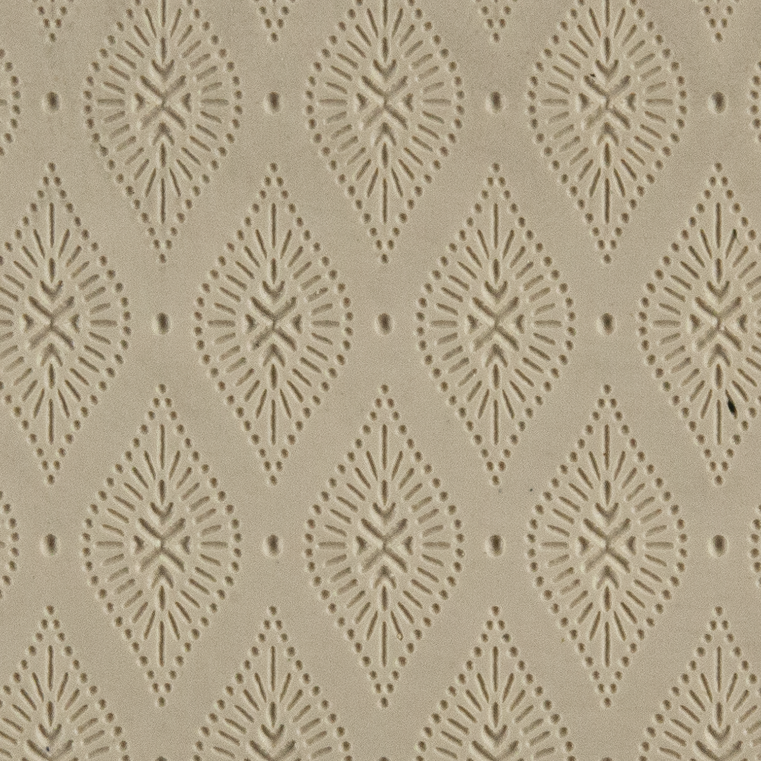 Texture Tile - Boho Glows Embossed. Beige Texture Tiles are flexible, washable and can be used with any soft clay. Spritz with CoolSlip or dust on Dry Powder Release for stick-free impressions when using metal clay and polymer clay.