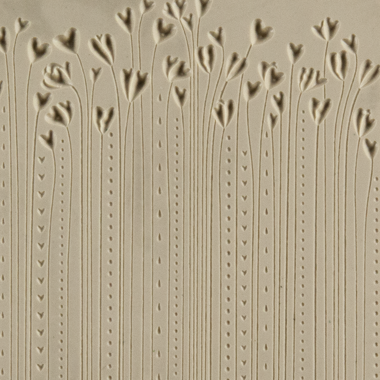 Texture Tile - Hearts in Bloom Embossed. Beige Texture Tiles are flexible, washable and can be used with any soft clay. Spritz with CoolSlip or dust on Dry Powder Release for stick-free impressions when using metal clay and polymer clay.