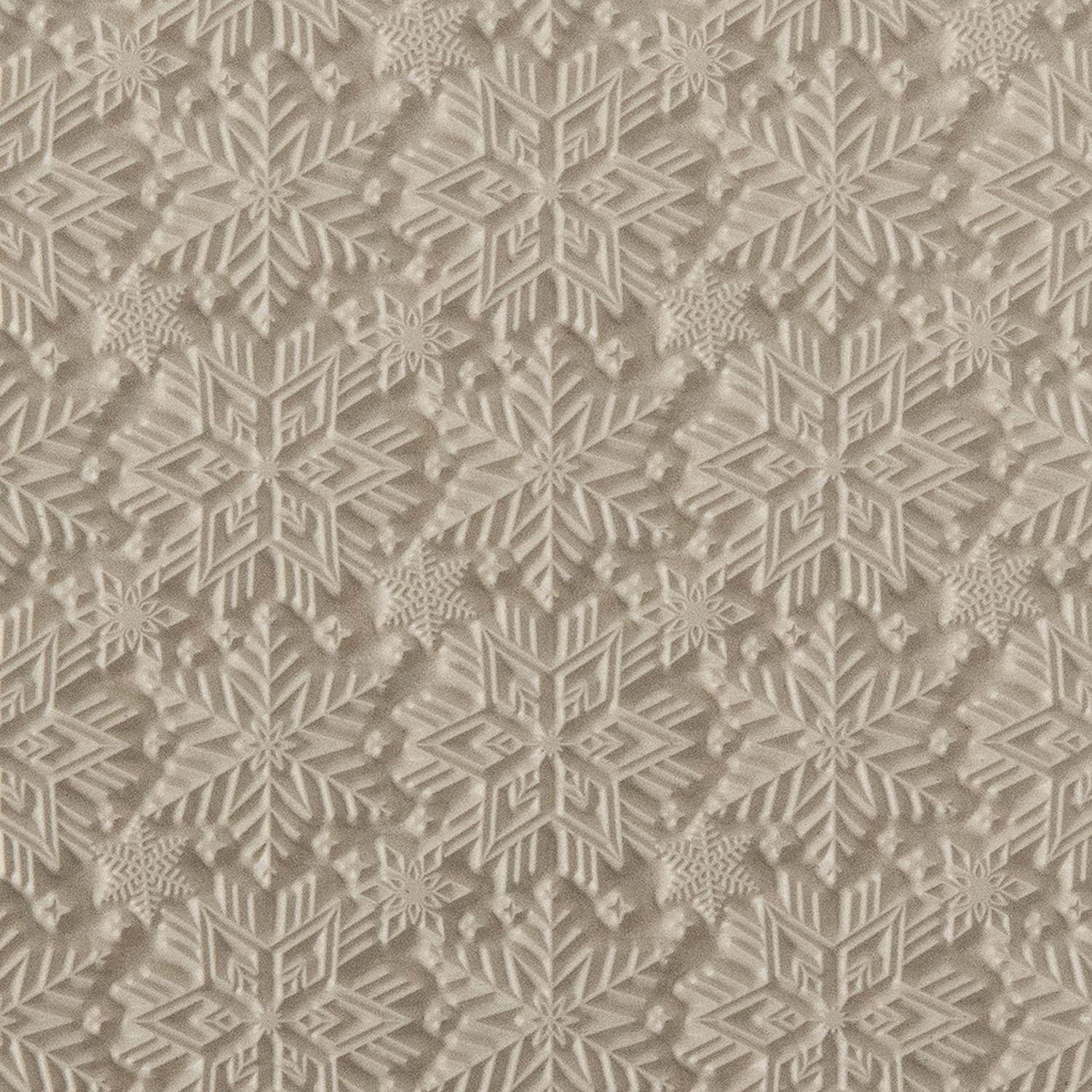 Texture Tile - Snowflakes. Beige Texture Tiles are flexible, washable and can be used with any soft clay. Spritz with CoolSlip or dust on Dry Powder Release for stick-free impressions when using metal clay and polymer clay.