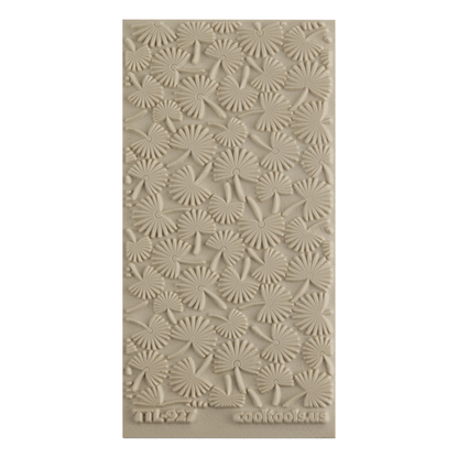 Texture Tile - Coastal Foliage. Beige Texture Tiles are flexible, washable and can be used with any soft clay. Spritz with CoolSlip or dust on Dry Powder Release for stick-free impressions when using metal clay and polymer clay.