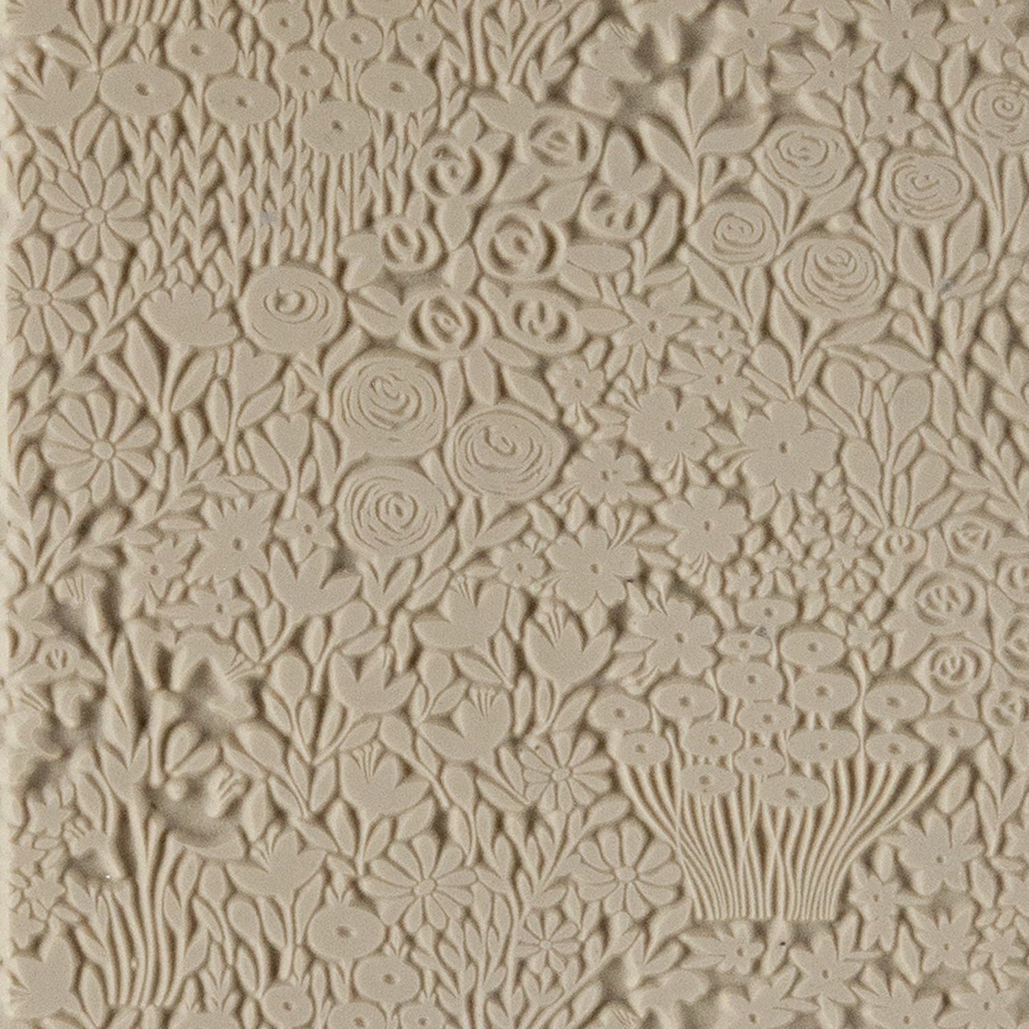 Texture Tile - Field of Flowers. Beige Texture Tiles are flexible, washable and can be used with any soft clay. Spritz with CoolSlip or dust on Dry Powder Release for stick-free impressions when using metal clay and polymer clay.